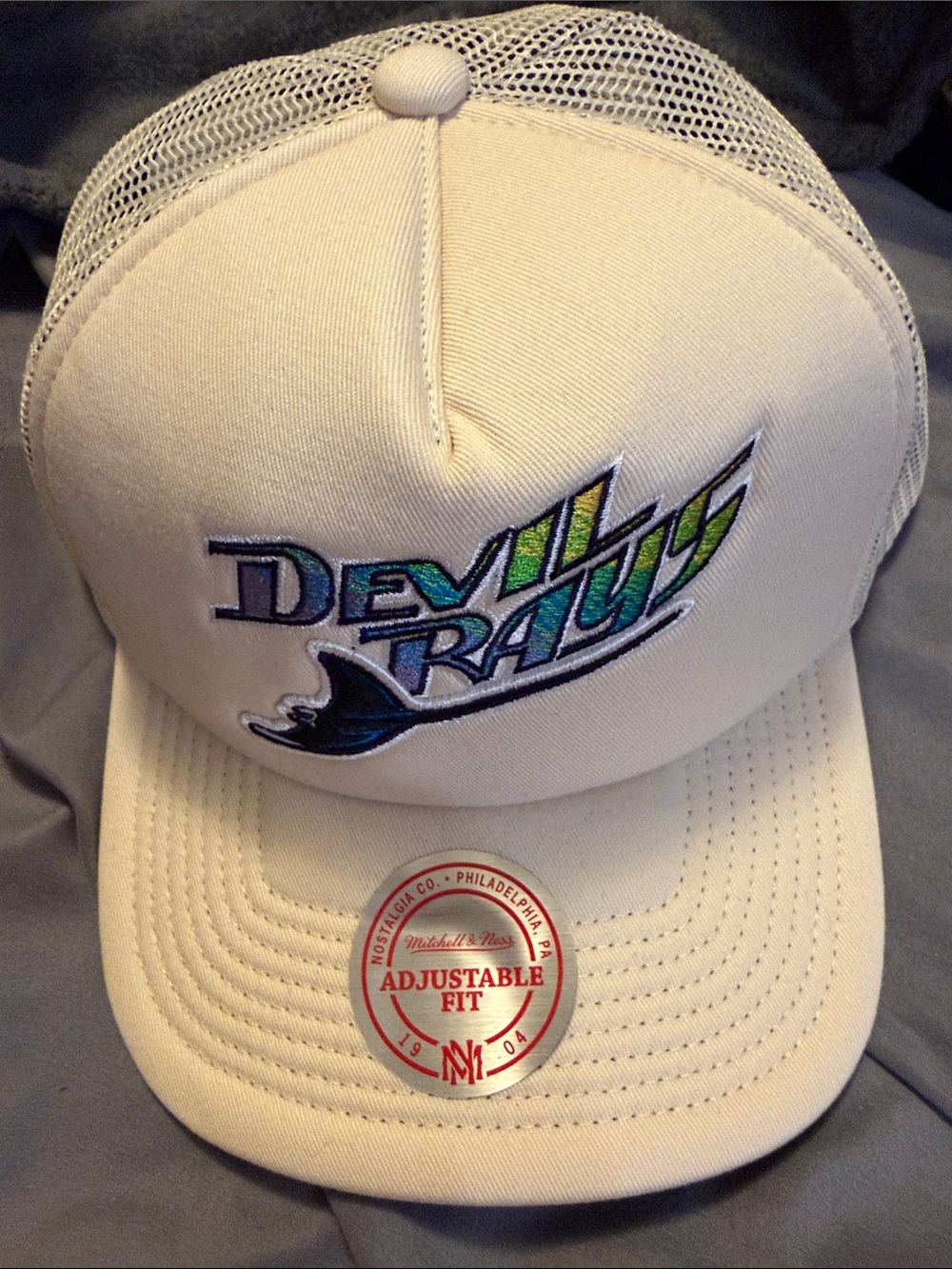 Mitchell & Ness Cream Trucker Hat with Teal, Lime & Black Devinray Logo